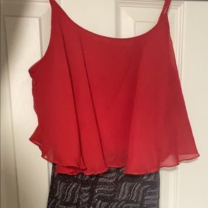 It’s a dress with spaghetti straps. Size medium